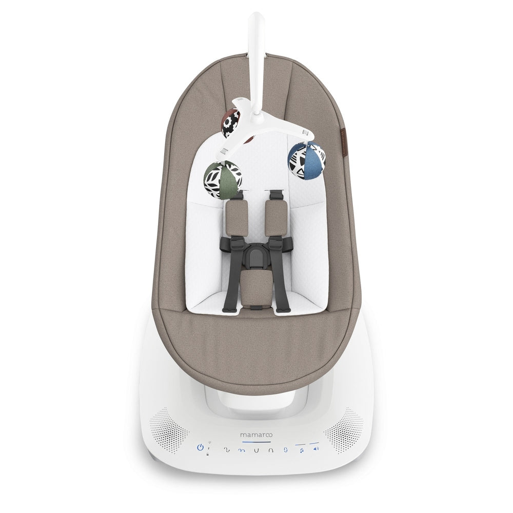 Uppababy Mamaroo Smart Swing with brown seat insert and white base; overhead toy arch with colorful balls