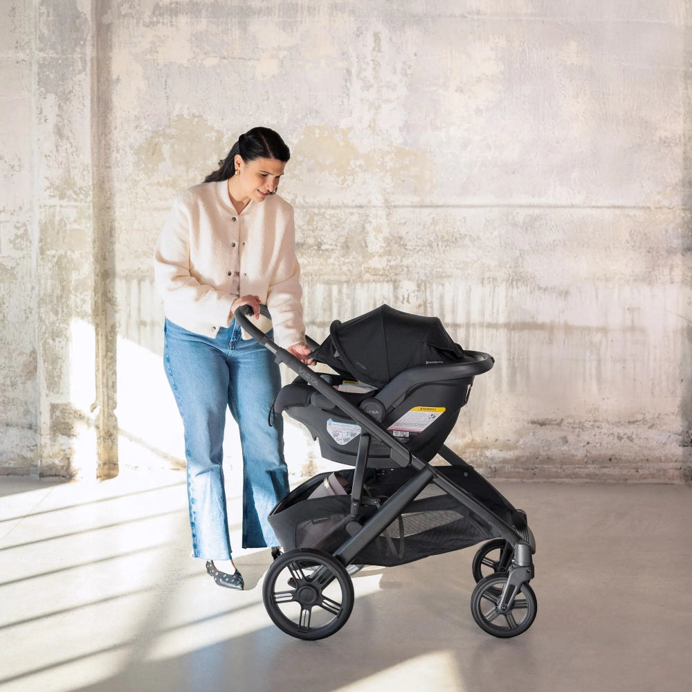 UPPABABY UPPAbaby Mesa V3 Infant Car Seat attached to stroller base with three wheels and storage basket img 2/36