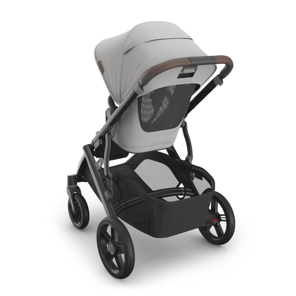 UPPAbaby Vista V3 stroller in light gray with brown leather handlebar and bassinet cover.