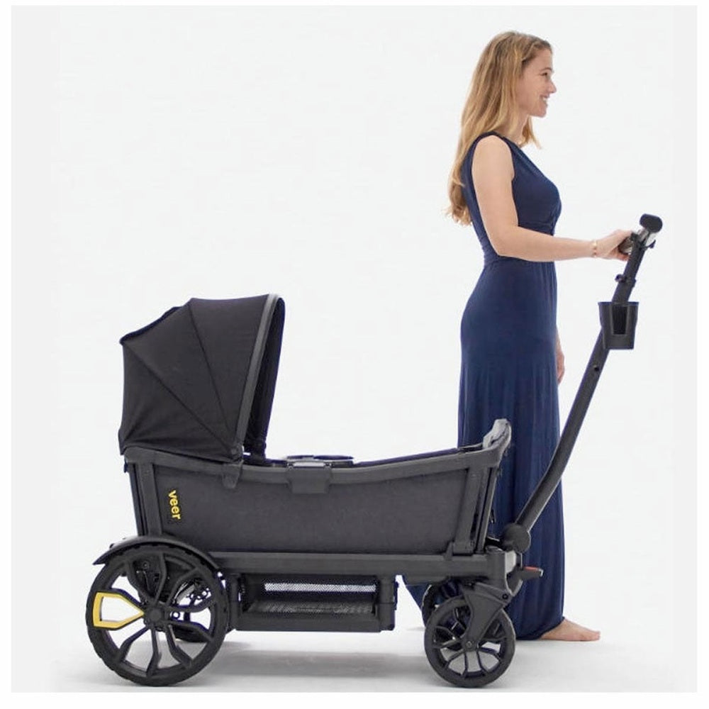 Veer All-Terrain Cruiser Wagon side view in dark gray with canopy and push handle