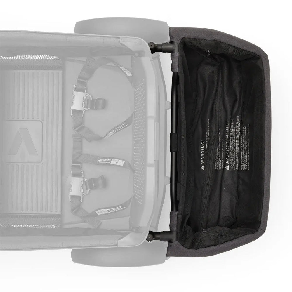 Veer Cruiser Basket attached to stroller frame, showing a spacious black fabric interior and mounting hardware.