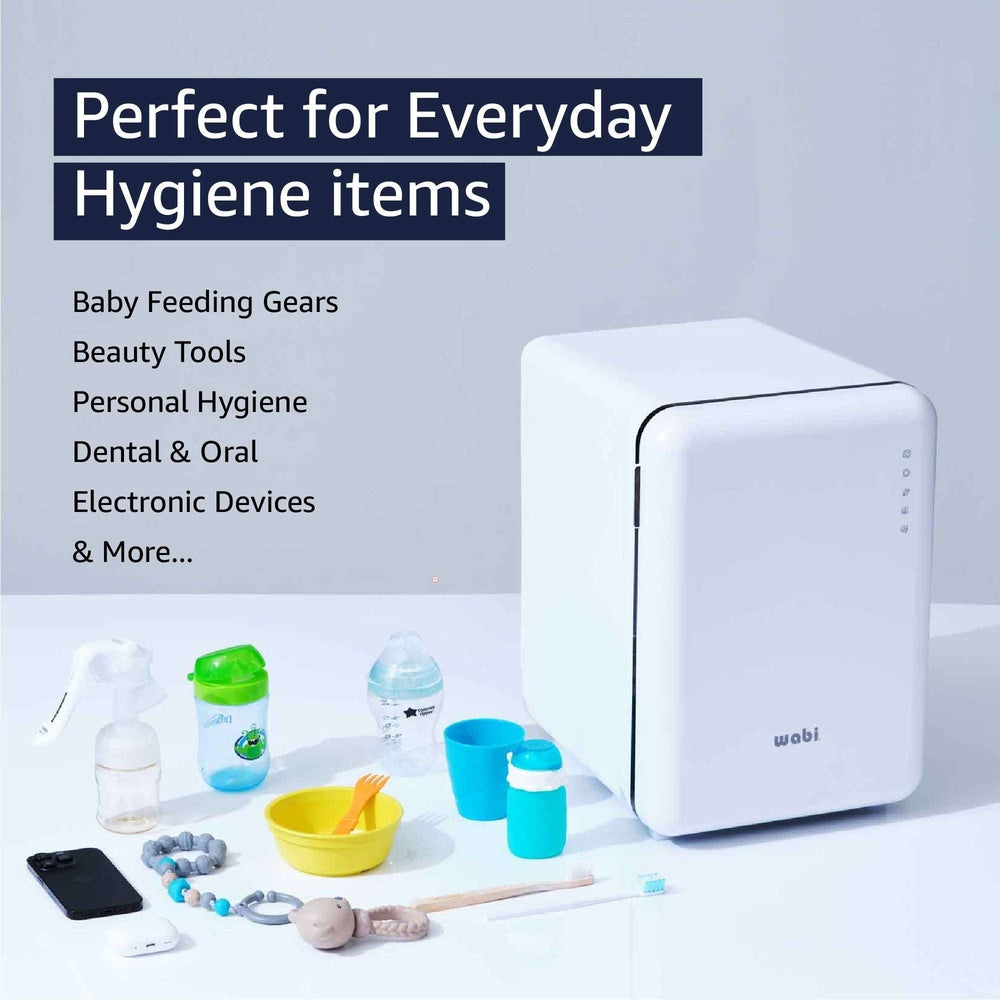 Wabi Baby UVC LED Sanitizer & Dryer 360 white countertop appliance with bottles, cups and feeding items