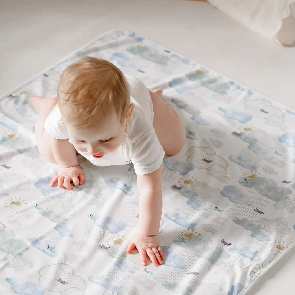 NEST DESIGNS Nest Designs Waterproof Change Pad Small Summer Days quilted padded construction with cloud and sunshine print img 4/9