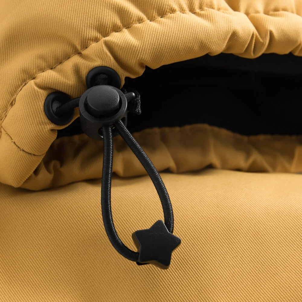 Weedo Wild Thing Mittens in mustard yellow, featuring a black adjustable drawcord and star charm in a close-up.