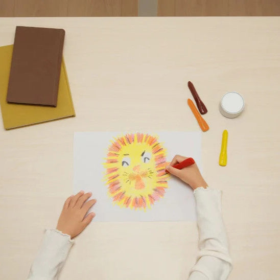 Yeelight Natural Light Floor Lamp on a tidy desk beside a child's crayon drawing scene.