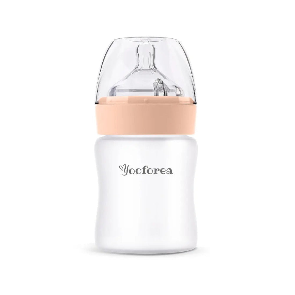 Yooforea Silicone Coated Glass Baby Bottle 5Oz/150Ml with peach cap, standing upright.