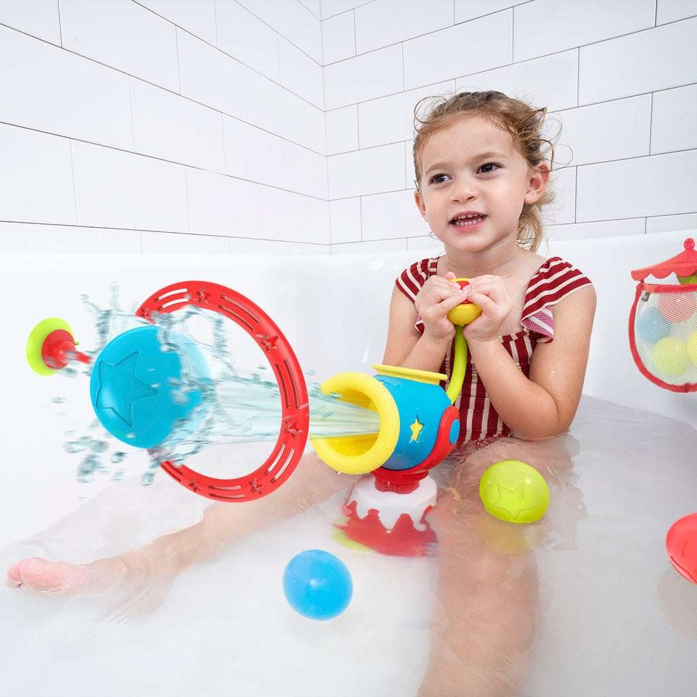 Yookidoo Ball Blaster Water Cannon bath toy, blue and yellow with red ring, child playing in tub