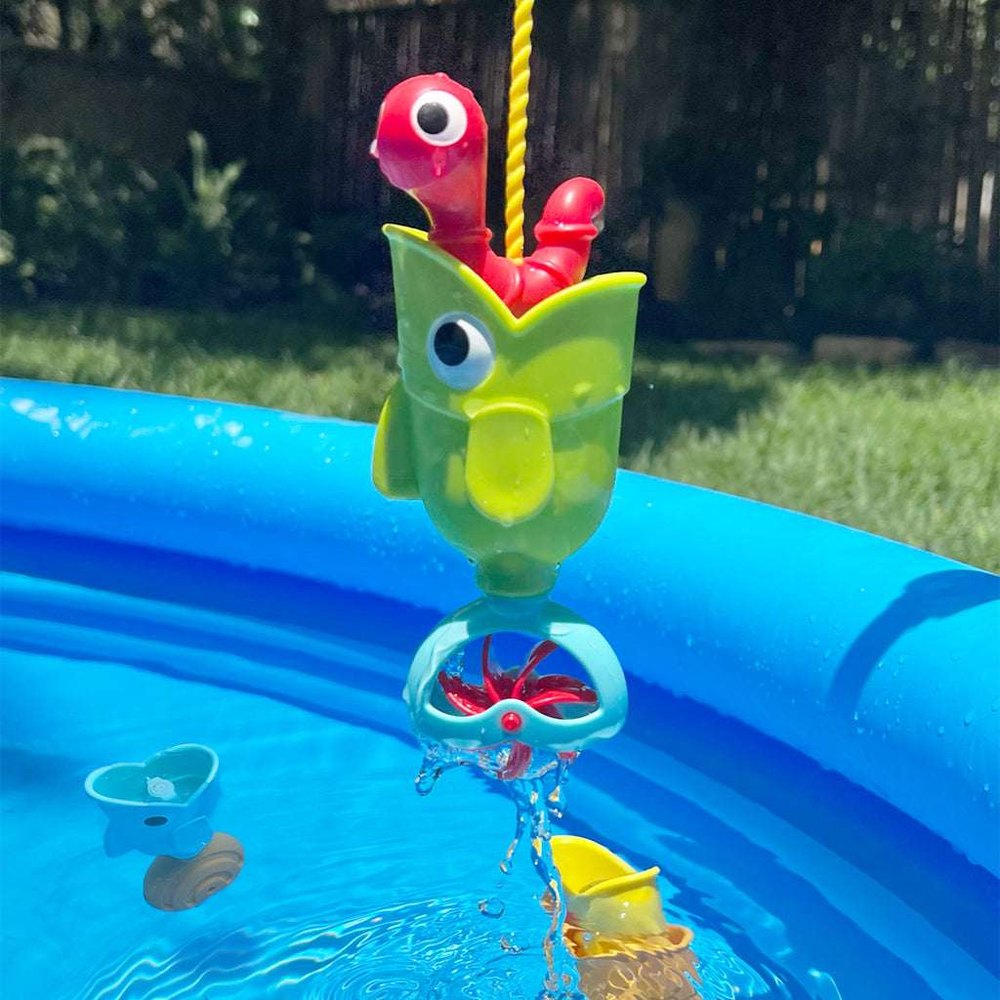 Yookidoo Catch 'N' Sprinkle Fishing Set bath toy featuring a green whale cup and red worm lure