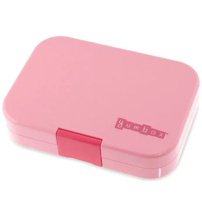 Yumbox Original 6-compartment lunchbox in pink, snapped shut by the pink latch.