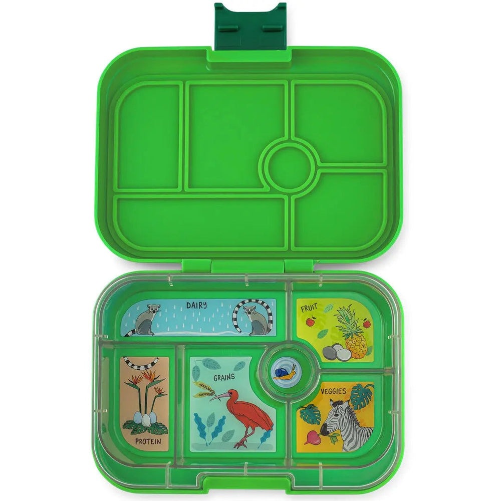 Yumbox Original 6 Compartment Lunchbox open with green lid, showing dairy, grains, fruit, veggies, and protein sections.