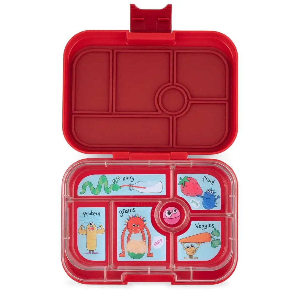 Yumbox Original 6-compartment lunchbox in red, open to show labeled sections for dairy, fruit, protein, grains, veggies.