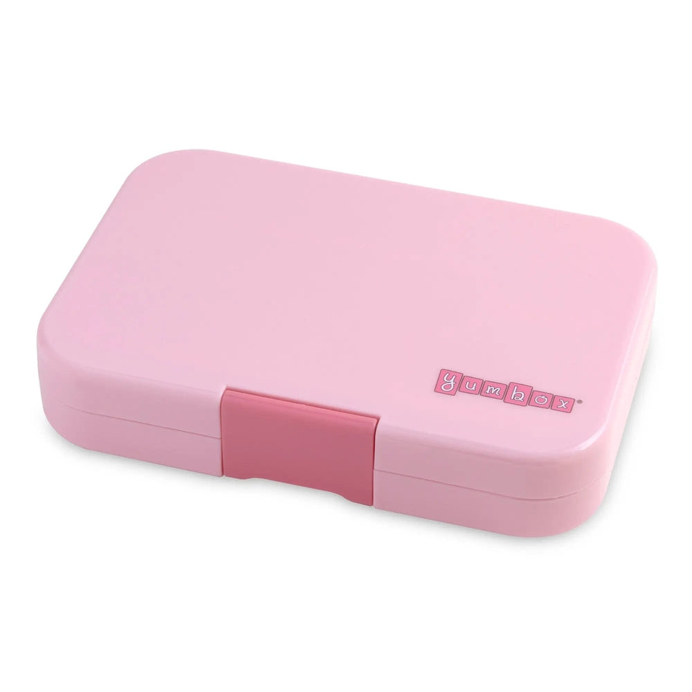 Yumbox Tapas 4-Compartment lunchbox in pink, closed with pink latch showing YumBox branding.