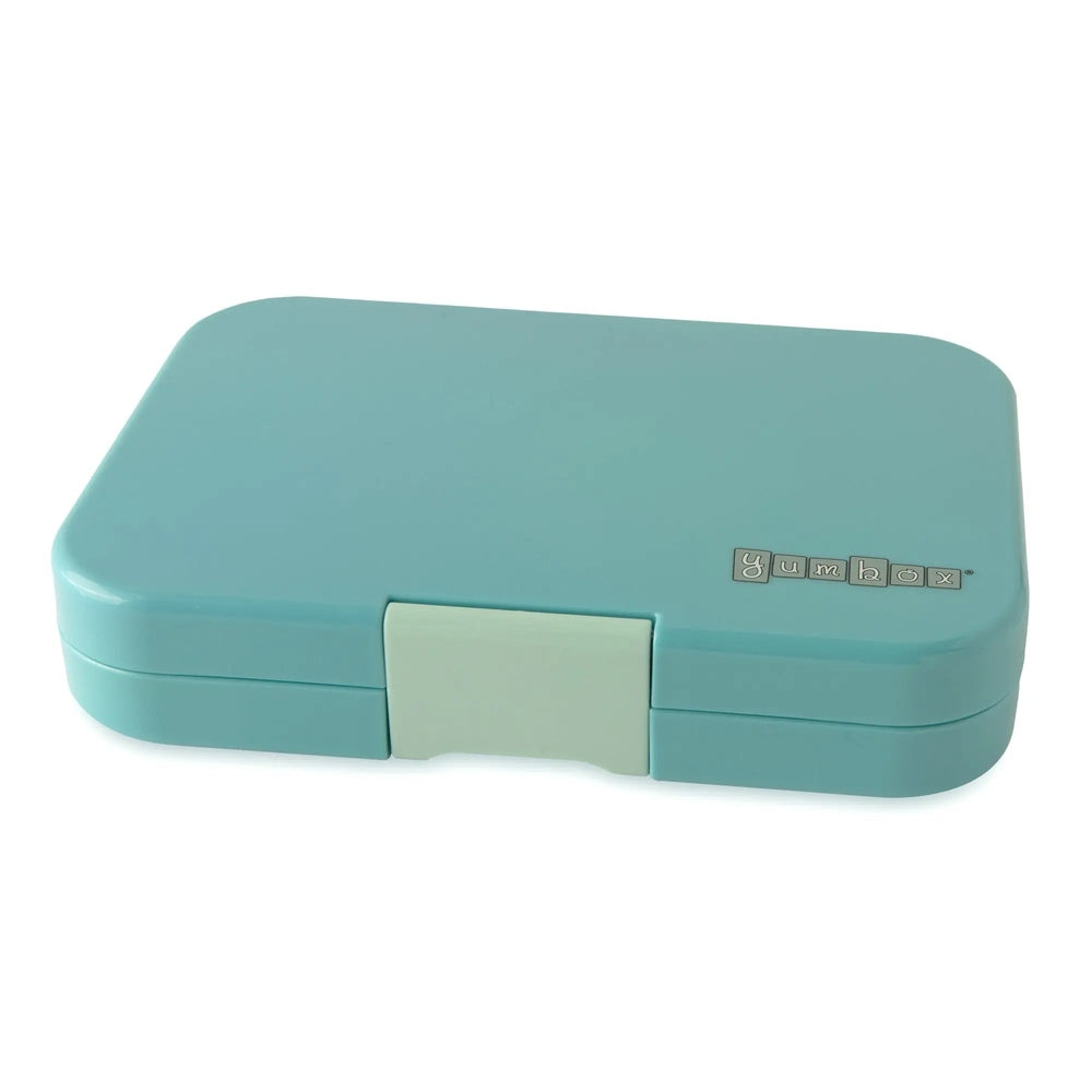 Yumbox Tapas 5-compartment lunchbox in turquoise, closed with beige latch securing the halves.