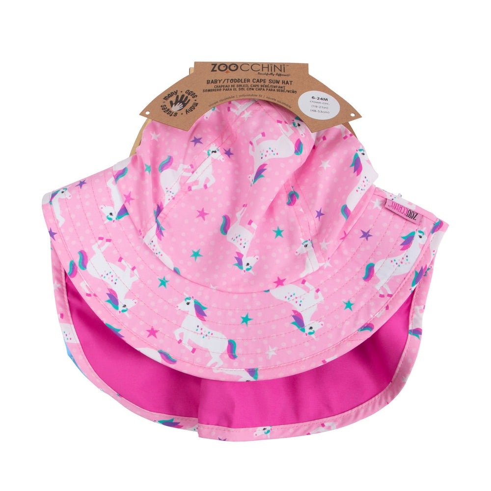 Zoocchini Baby/Toddler Cape Sun Hat-Unicorn pink wide-brim sun hat with white unicorns; shown laid flat.